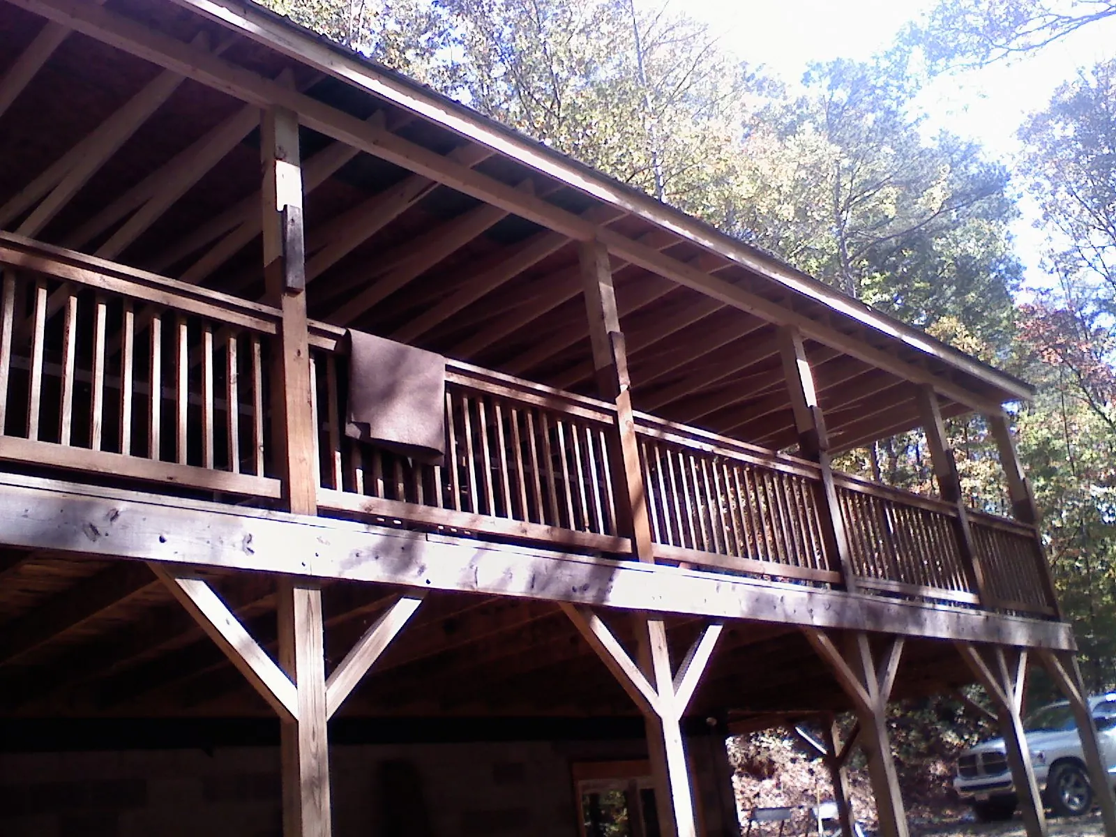 Timber framing under a new elevated porch and deck — Roof Leak Repair in Ringling by Roofing Brothers